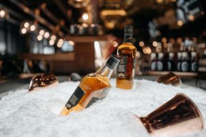 Glass bottles kept in ice Glass bottles kept in ice